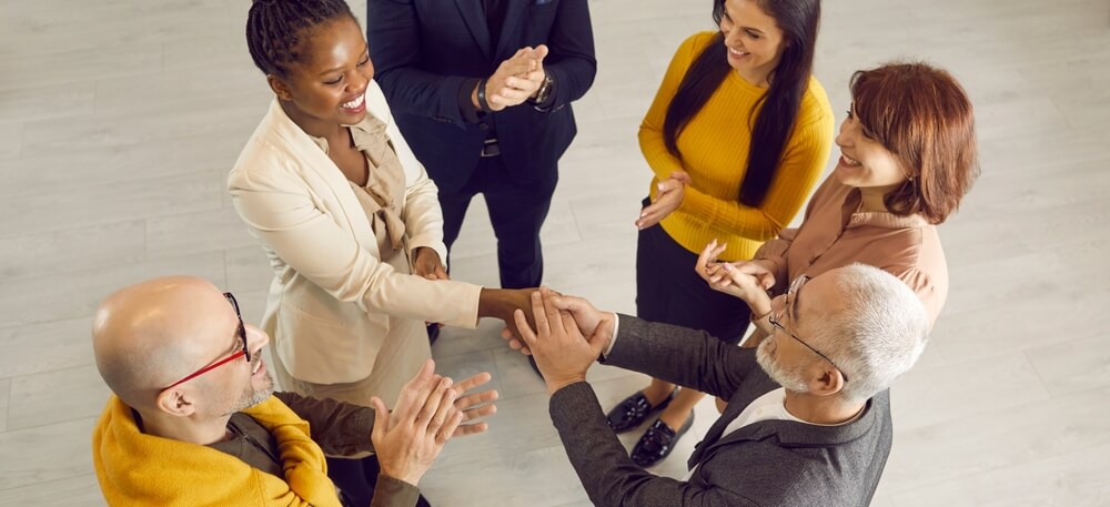 Group Of Cheerful Positive Diverse Multiethnic People Meeting And Getting Acquainted At Casual Business Event.
