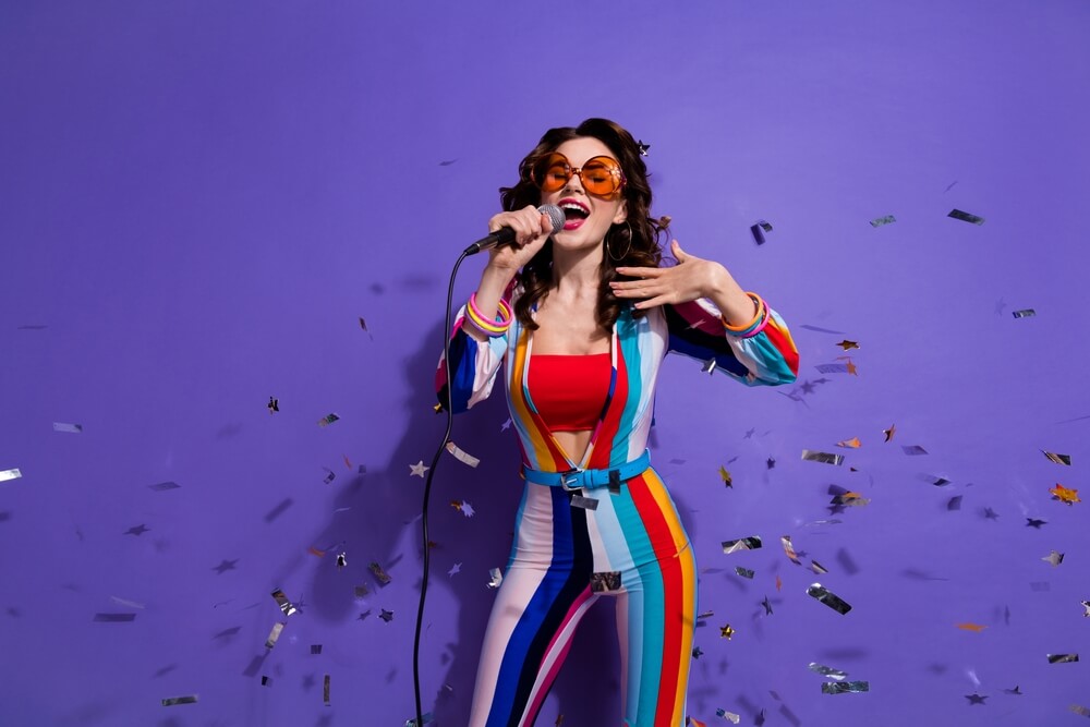 A girl singing disco songs.