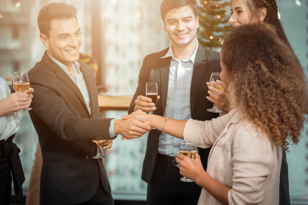 A group of people at the corporate celebration.